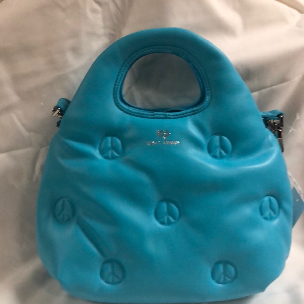 Blue bag/purse with peace signs on front